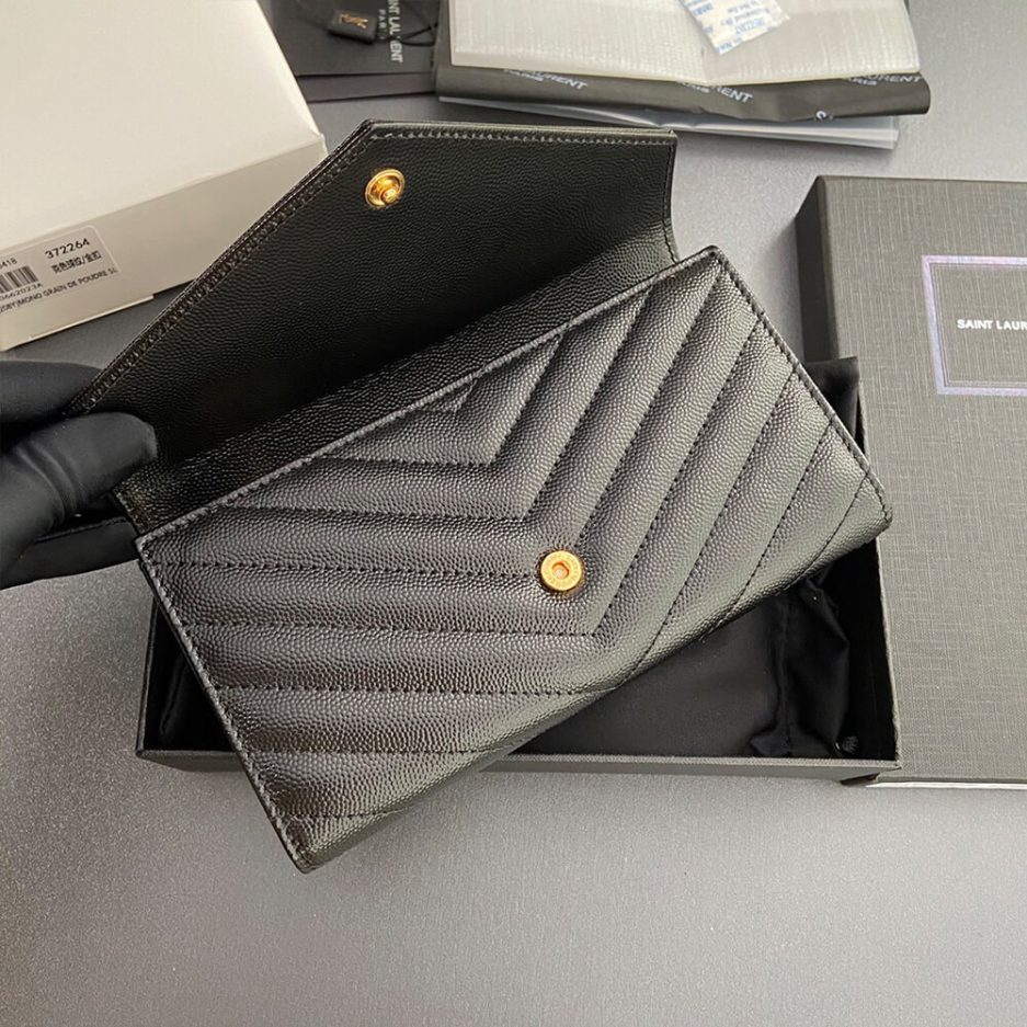 YSL CASSANDRE MATELASSÉ LARGE FLAP WALLET IN GRAIN DE POUDRE LEATHER
